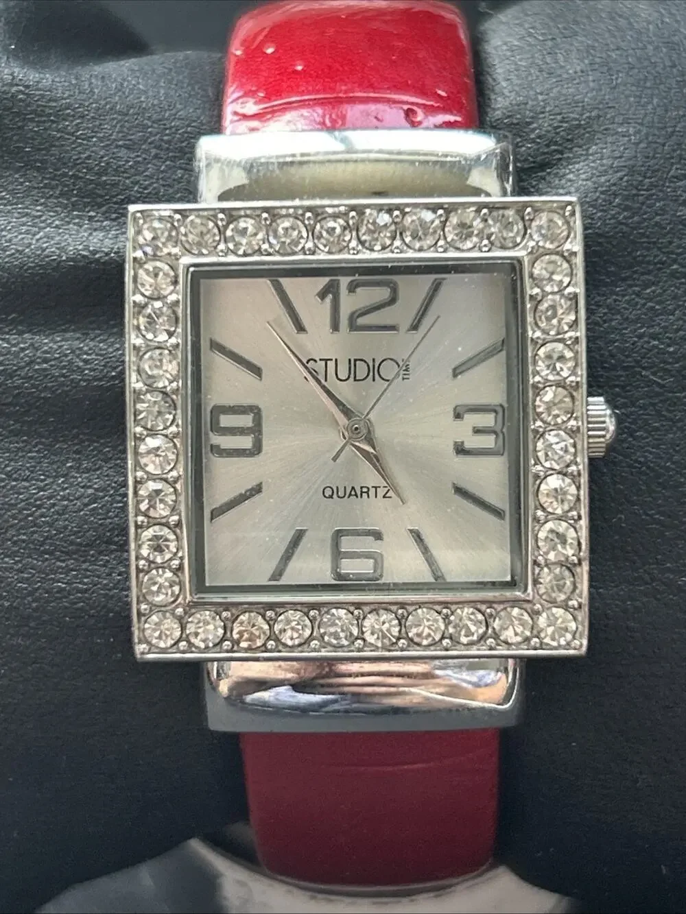Studio Time Silver Tone Case Red Band Women’s Cuff Watch
